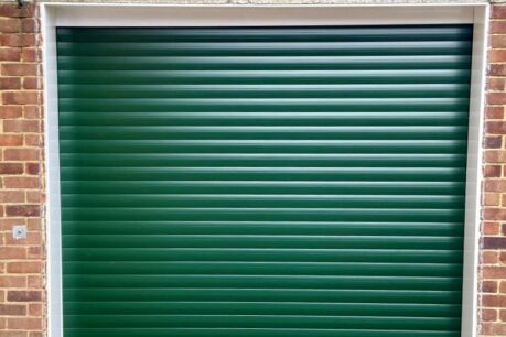 Alluguard 77 Rollershutter in Fir Green complete with radio remote controls and two hand transmitters