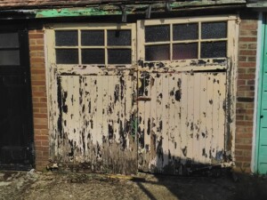 Steel side hinged garage doors manufactured by Cardale - Before