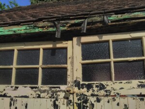 Steel side hinged garage doors manufactured by Cardale - Before