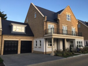 Black 'Cobham' garage doors after installation 