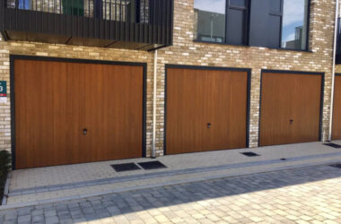 CDC GRP Garage Door Verwood Style in Honey Beech with anthracite grey frames and fully automated