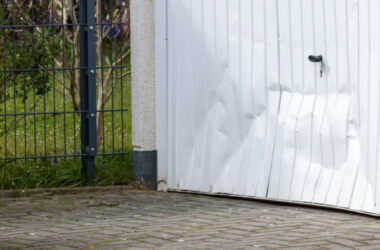 White Garage Door With A Dent