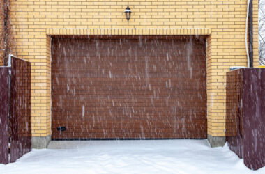 Slide door, roller shutter texture, garage gate in winter during snowfall