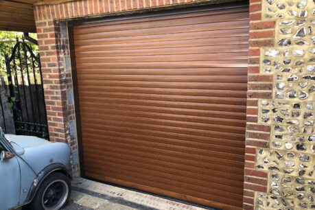 Novoferm Automatic Rollershutter Garage Door in Golden Oak