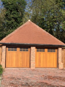 Double Garage with Novoferm's Leicester design doors in Light Oak