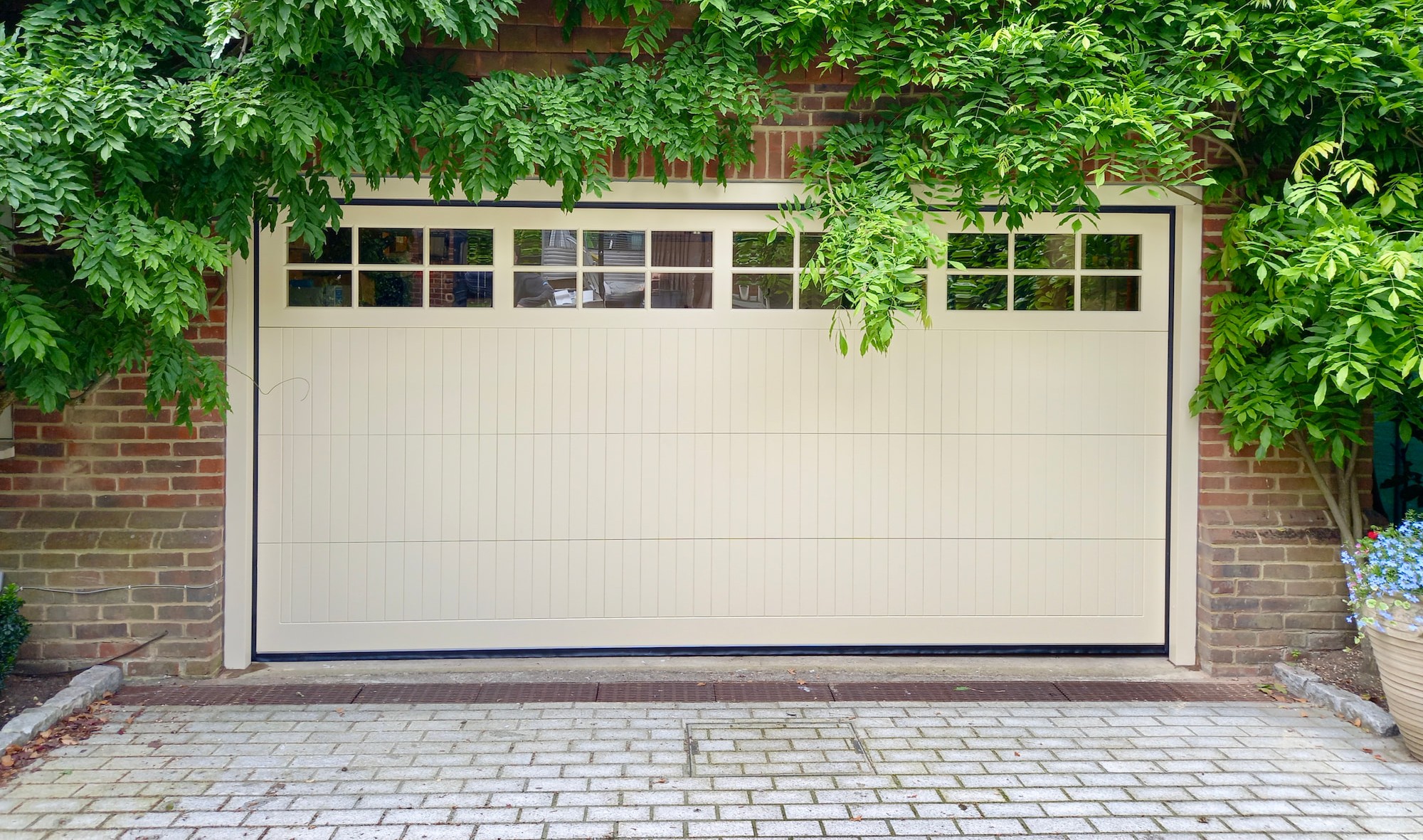 Timber Sectional Garage Door Cedar Door RAL 1015 Light Ivory Trent Design